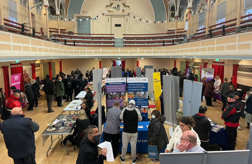 Hall with people and exhibitors at previous Jobs and Careers Fair