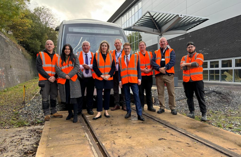 Andy Street, Nicola and Penny with the VLR team and the test vehicle at the Very Light Rail National Innovation Centre