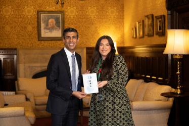Prime Minister Rishi Sunak and Nicola with the 2022 Christmas Card design winner